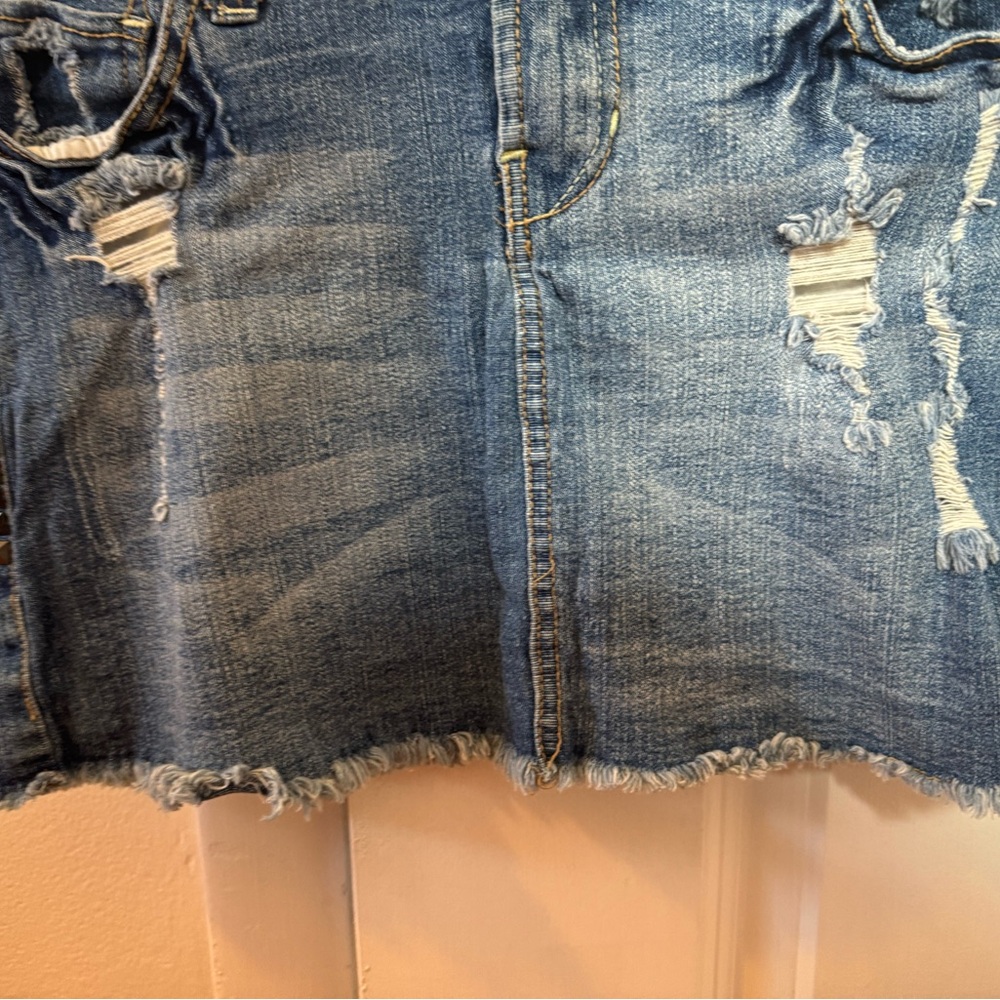 Distressed Blue Denim Jeans